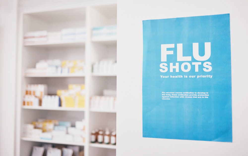 Flu shots poster at a pharmacy